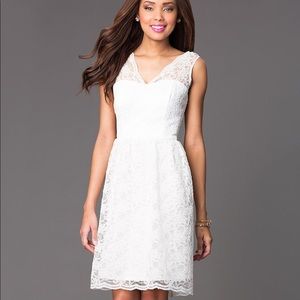 Short sleeveless lace V-Neck Dress by Marina